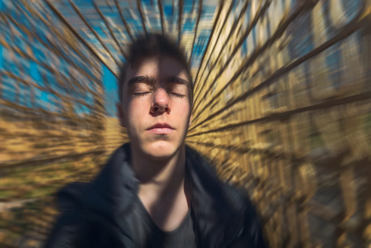 Mp41395712 portrait of a dreaming young man with moving background